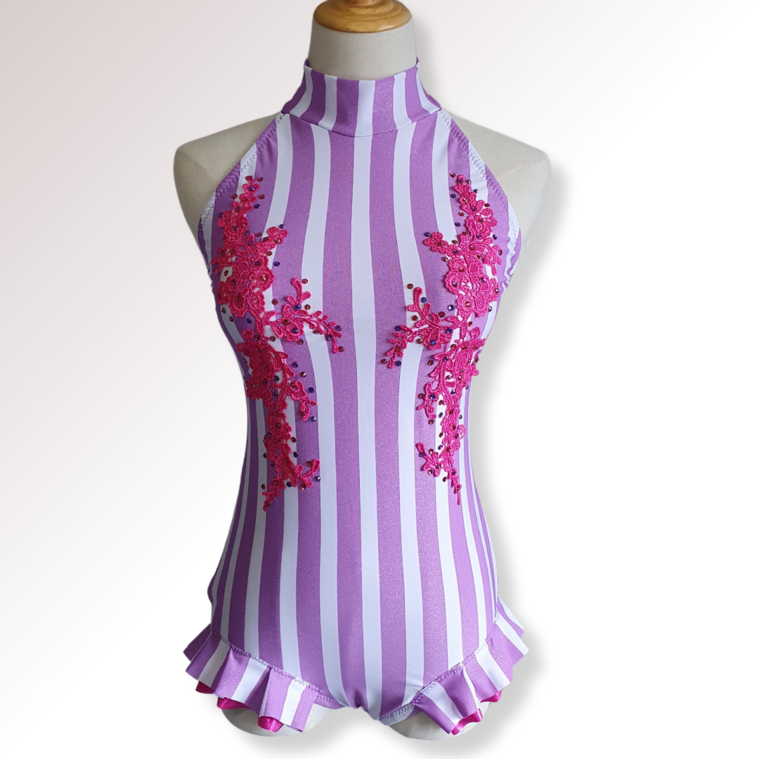 Purple and white striped costume with pink floral embellishments on a mannequin against a white background.